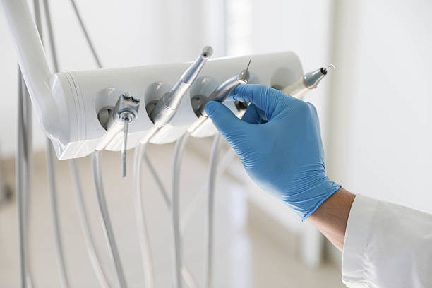 Professional Tooth Extraction technician working in DeQuincy, LA